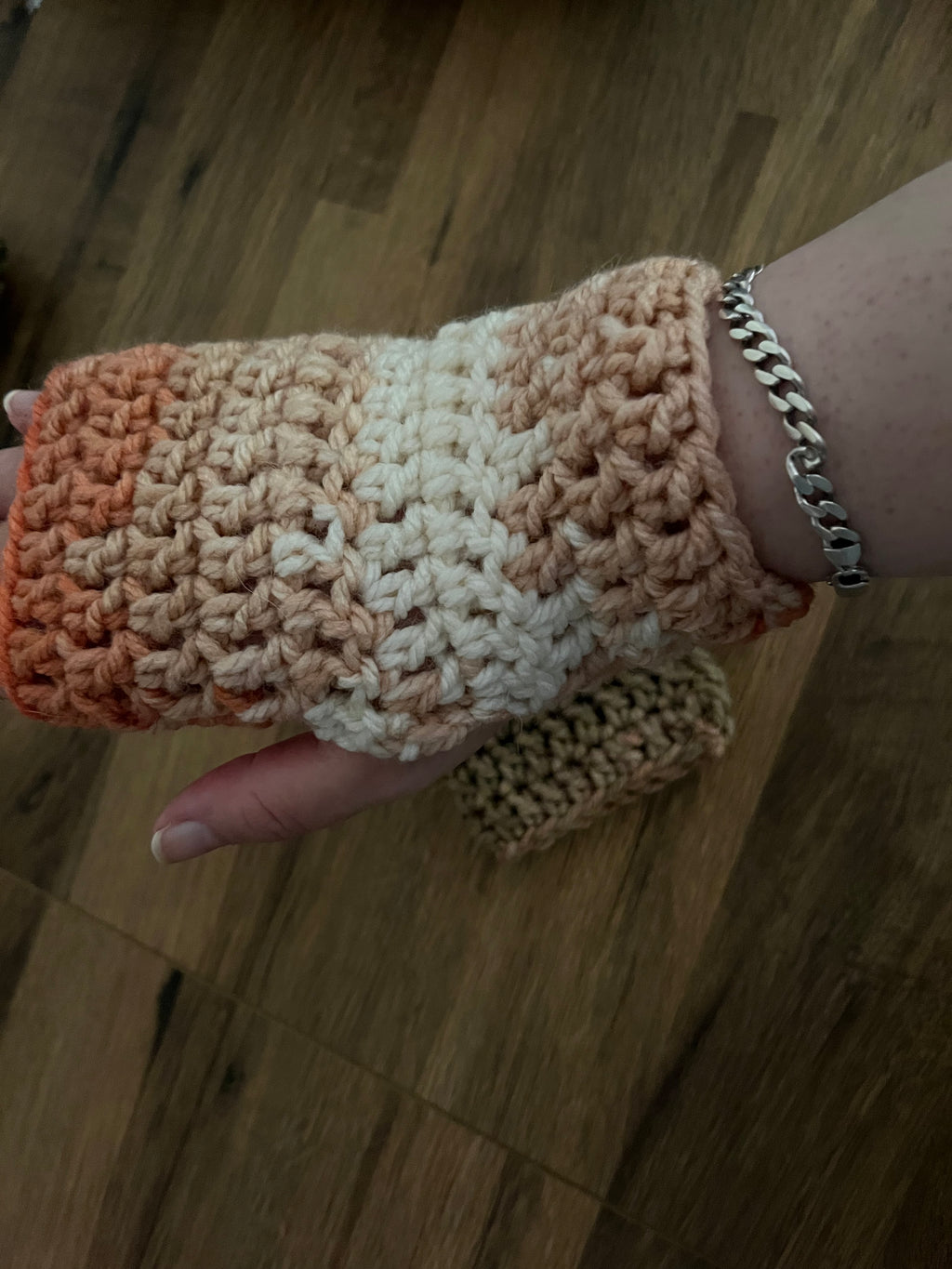Autumn coloured light and dark crocheted gloves