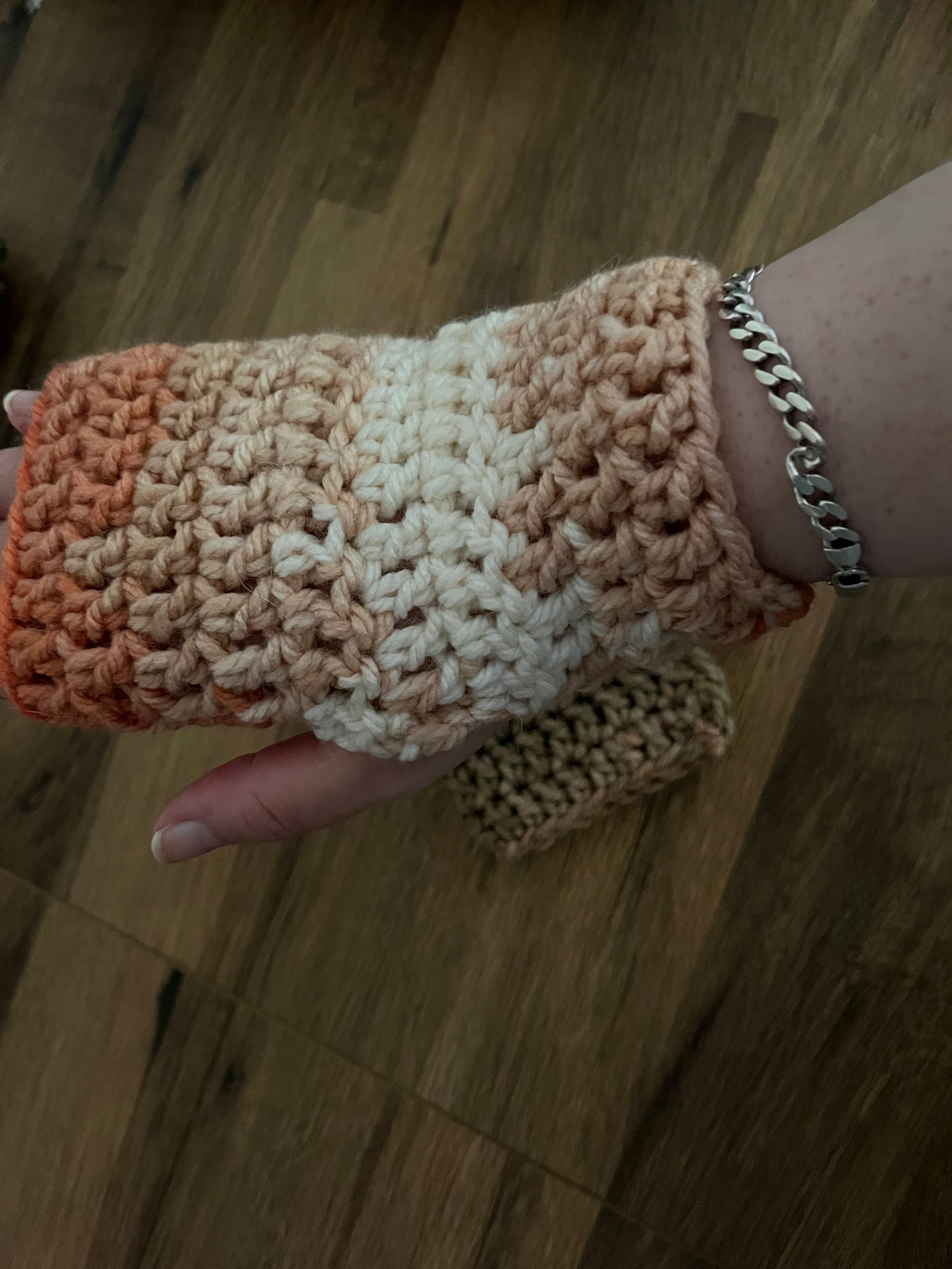Autumn coloured light and dark crocheted gloves