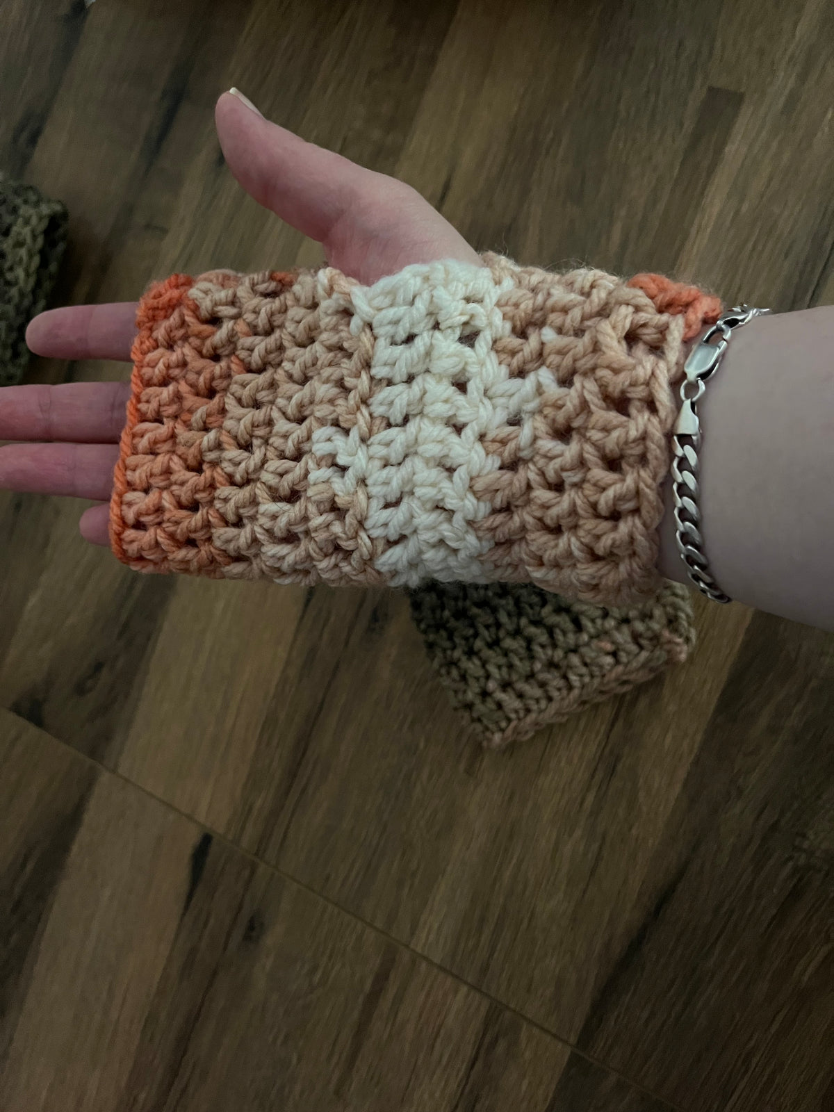 Autumn coloured light and dark crocheted gloves