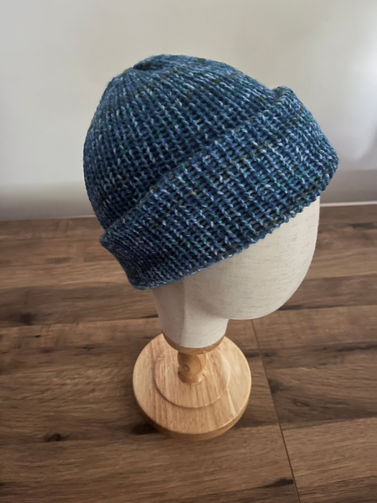Hand made knitted beanie hat in ocean blue colour