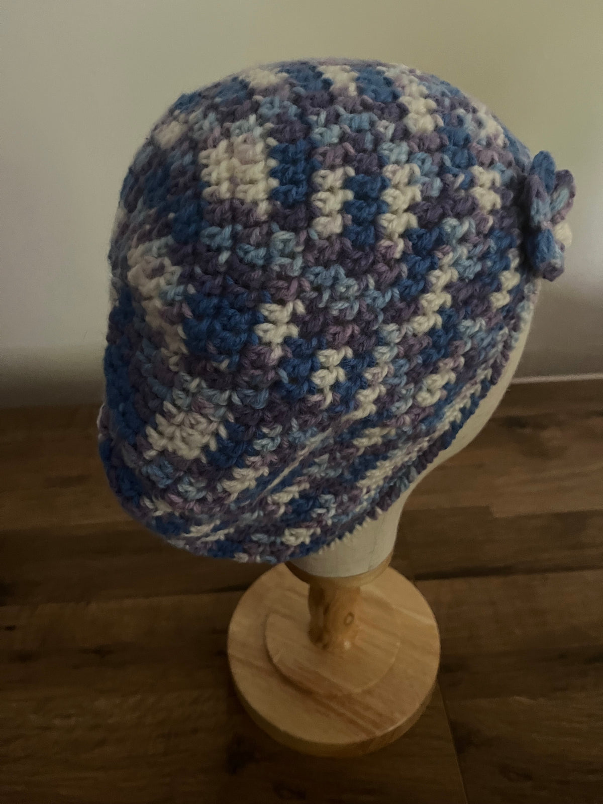 Hand made crocheted flower slouchy hat in a blue purple variegated colour